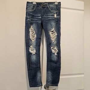 Machine distressed jeans